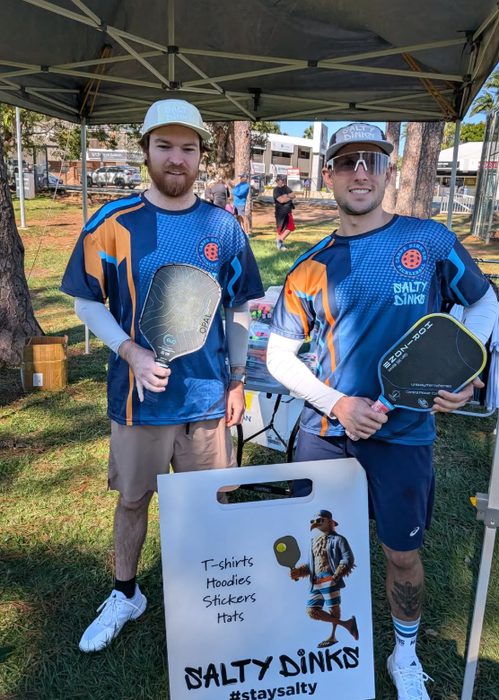 Two players at a Salty Dinks stall
